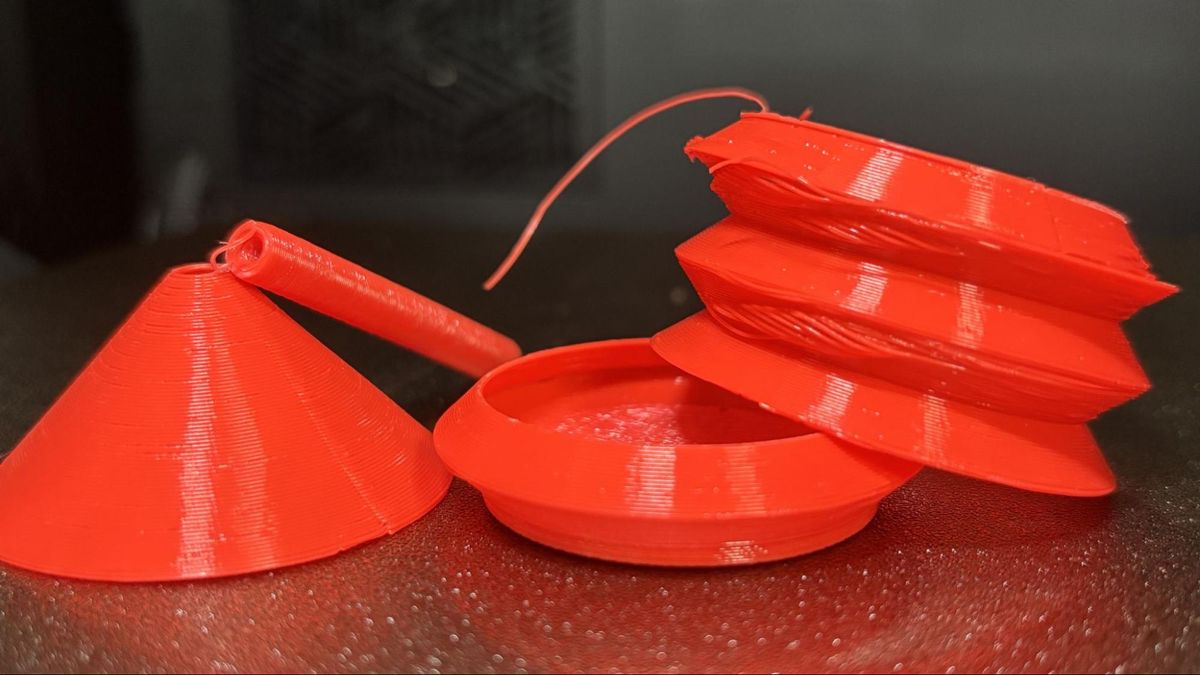 TPU air duster printed with under-extrusion on K2 Pro — characteristic failure