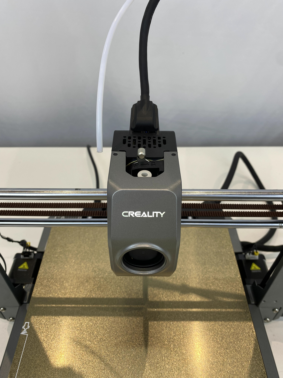 Ender-3 V3 toolhead: white PTFE tube and the collet clip that releases it