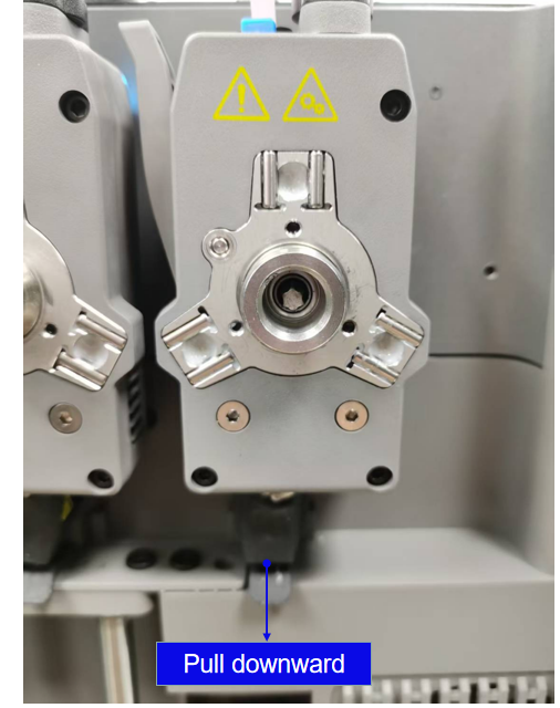 Removing the Flashforge Creator 5 nozzle assembly downward
