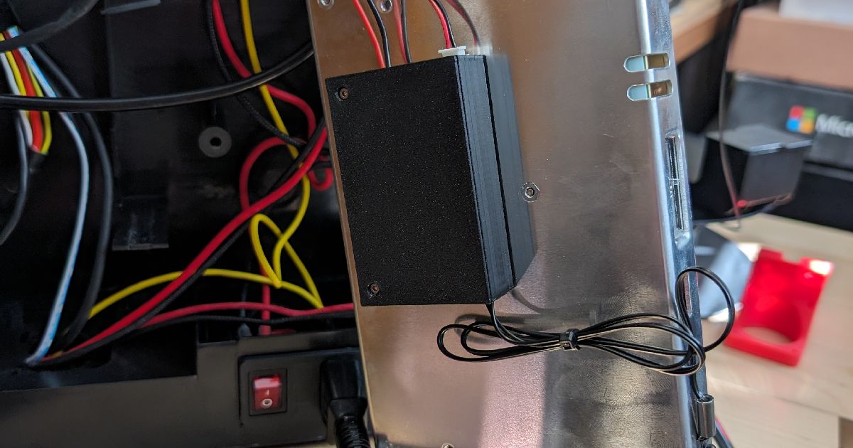 Printed enclosure holding a fan controller board on the QIDI Q1 Pro power supply
