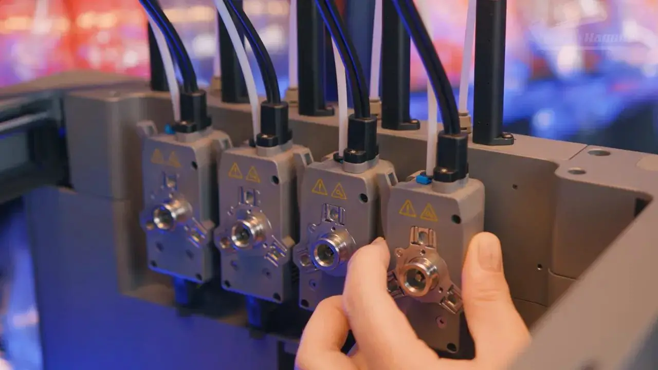 Four independent FlashSwap toolheads docked on the Flashforge Creator 5