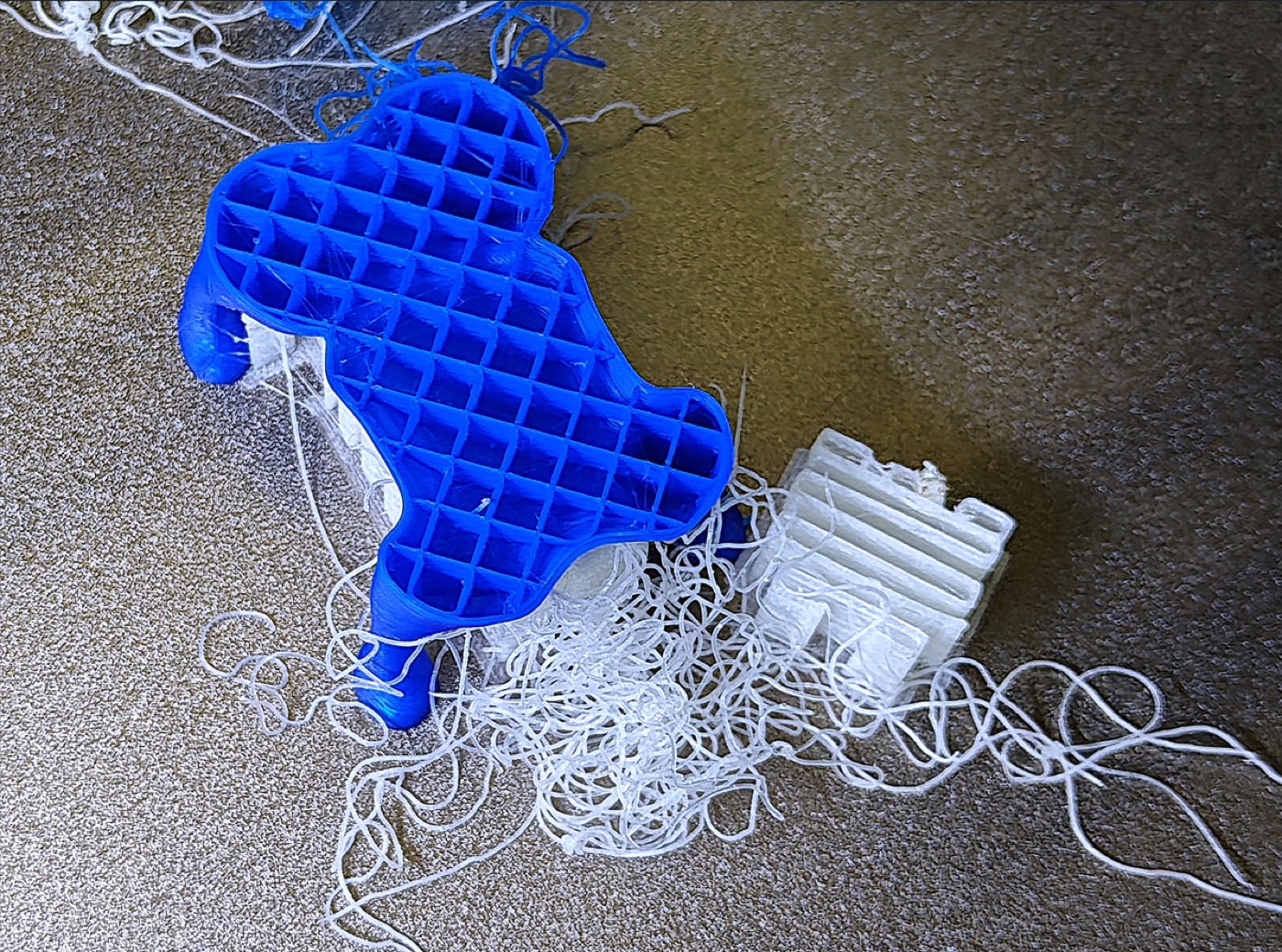 Failed multicolor print and collapsed prime tower on a Flashforge Creator 5