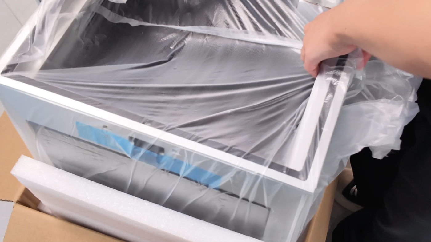 QIDI Q2 wrapped in protective film inside the packaging
