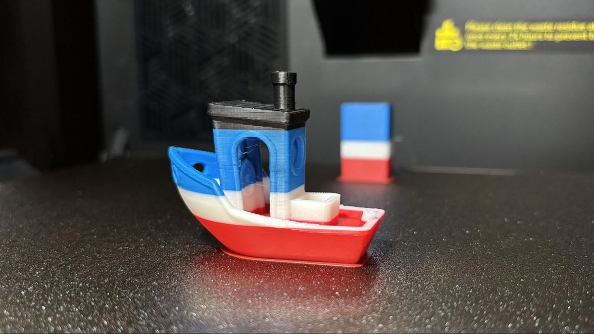 Multi-color Benchy on K2 Pro — complex geometry and dark colors often trigger AI false positives