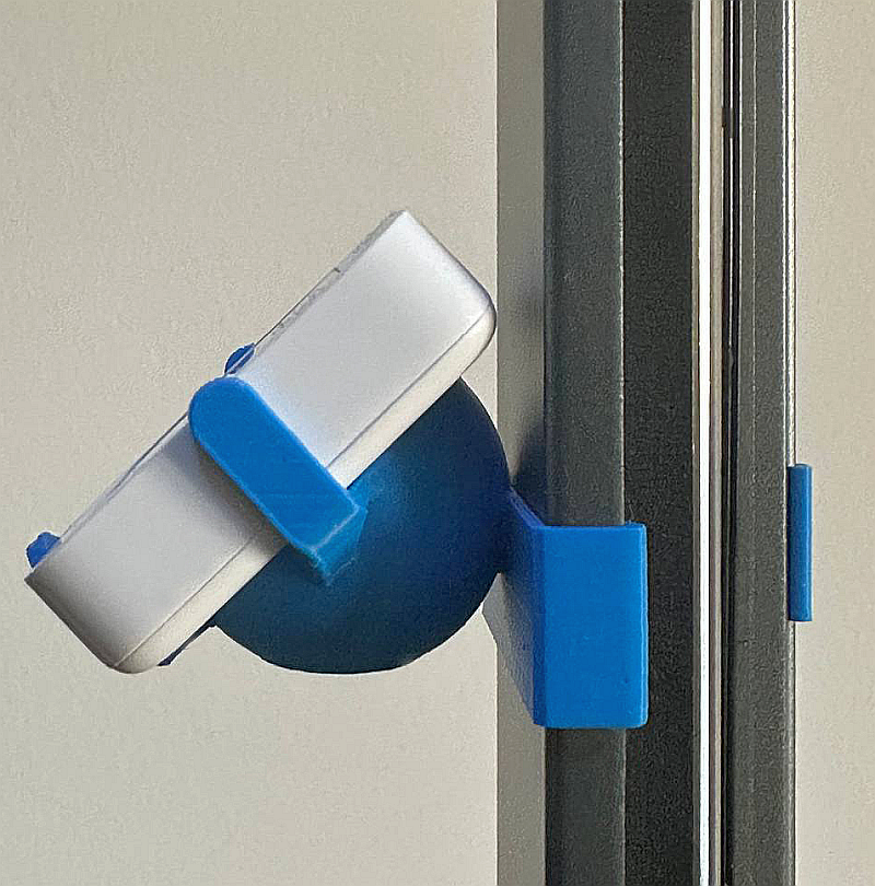 Printed temperature and humidity monitor holder on the frame of an Ender-3 V3 CoreXZ
