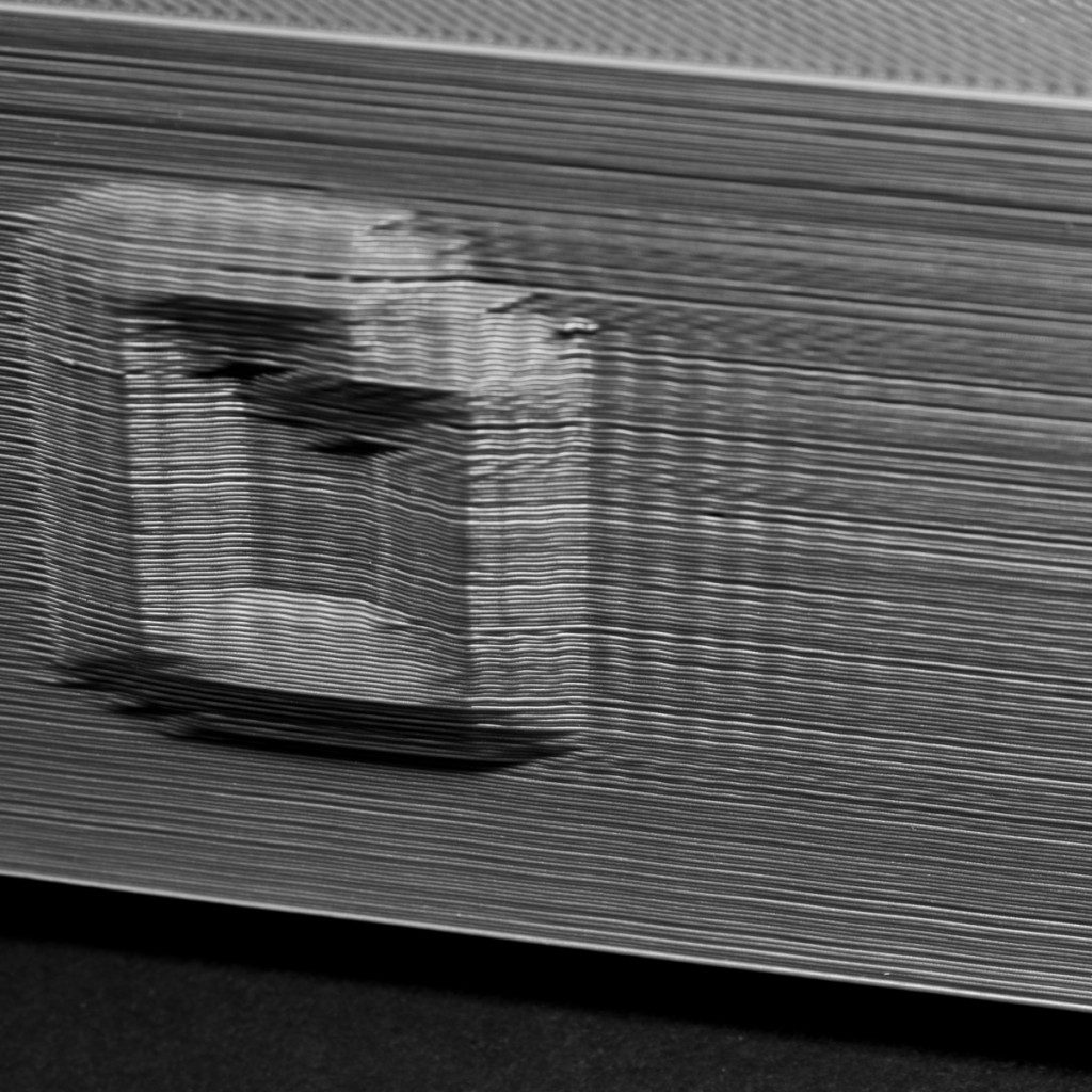 Пример ряби (ghosting/ringing) на стенках 3D-модели — волнистые узоры у углов