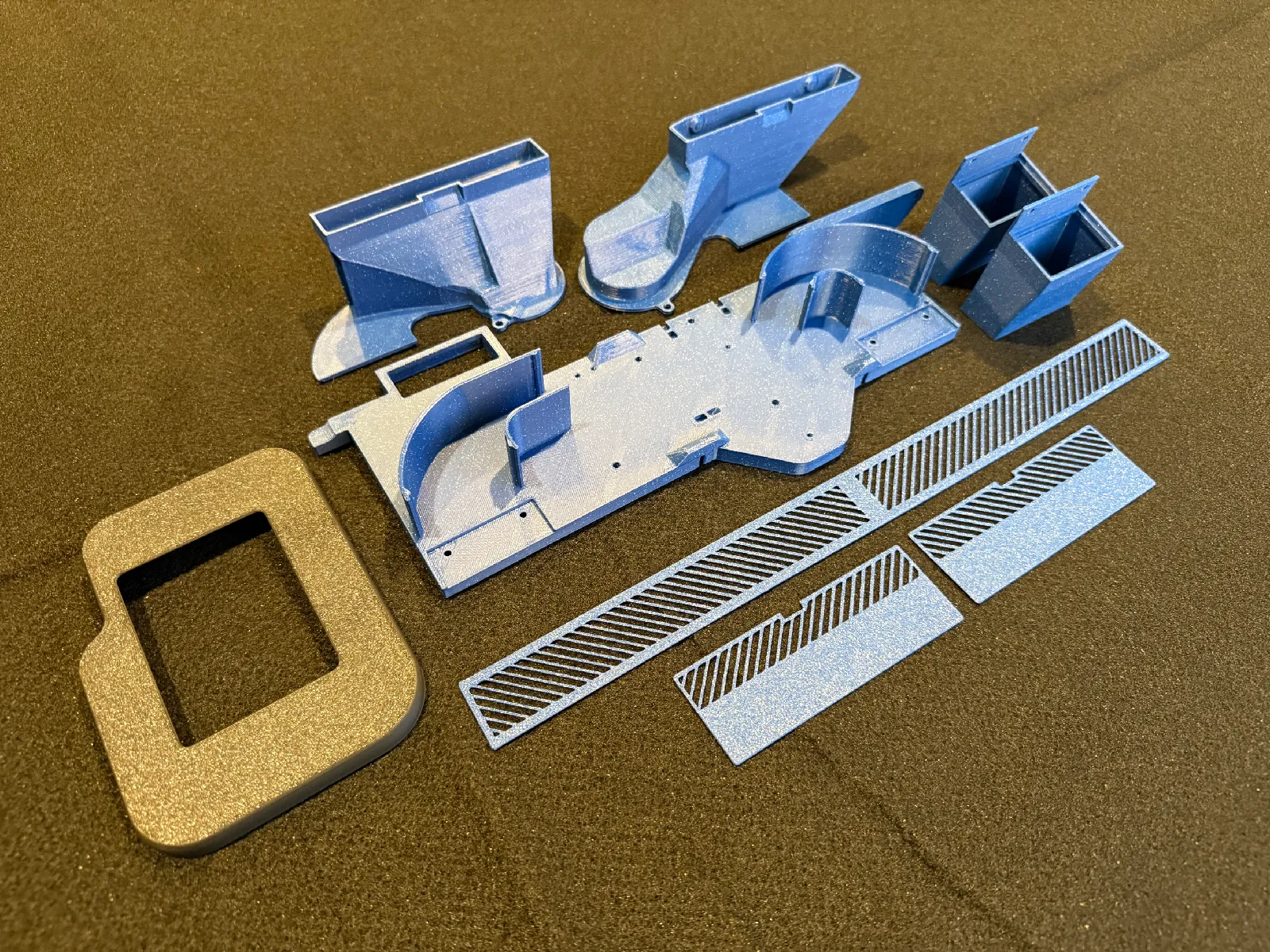 Internals of the red Space Pi Double housing with control board and heater before CFS install