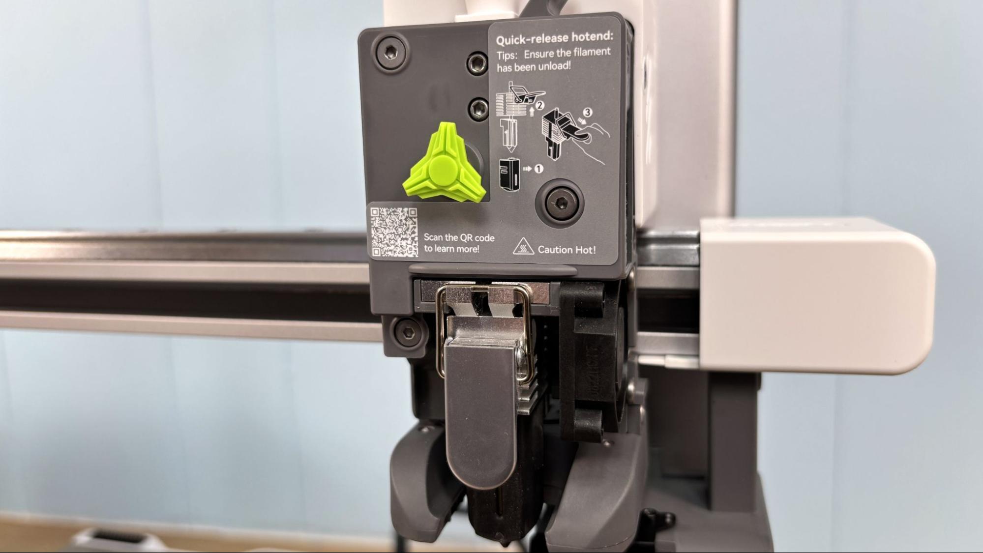 SPARKX i7 toolhead with quick-release hotend label and green cutter arm tab