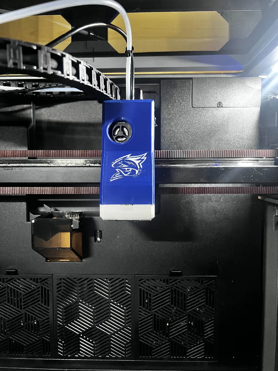 Cartographer 3D probe in blue housing mounted on Creality K2 toolhead