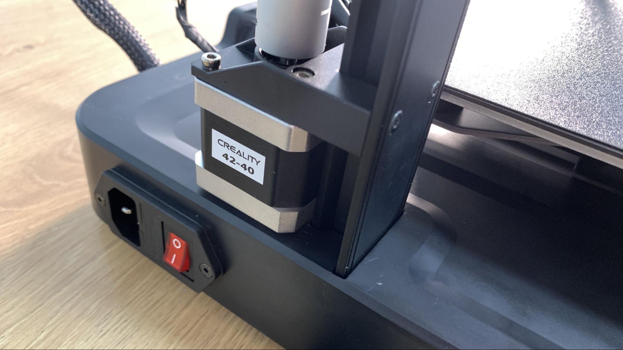 Ender-3 V3 KE bed with the strain-gauge mount in one corner