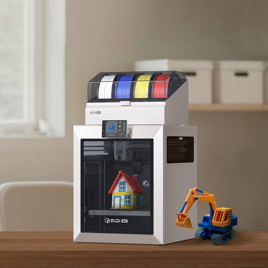 QIDI Q2 with QIDI Box in a home setting printing a small house model
