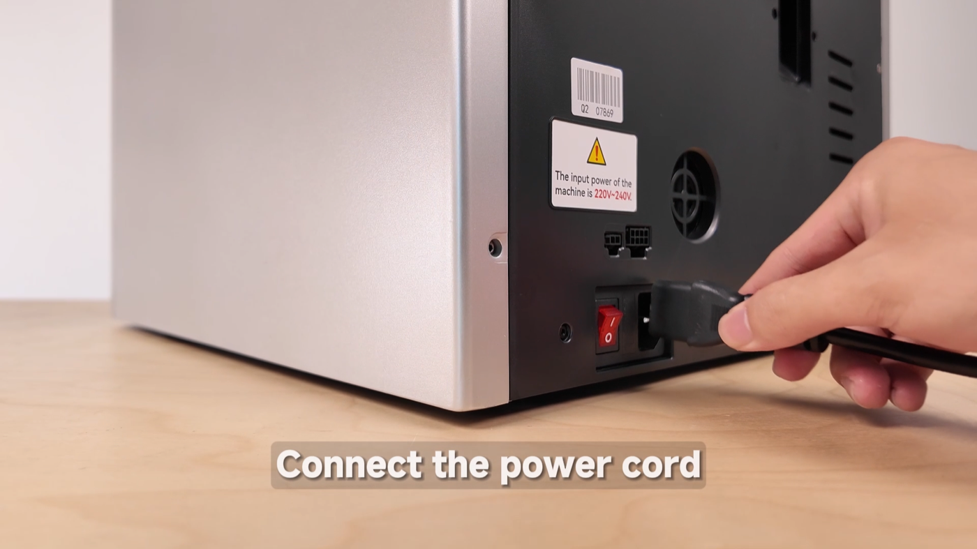 Connecting the power cord to the QIDI Q2, 220–240 V input
