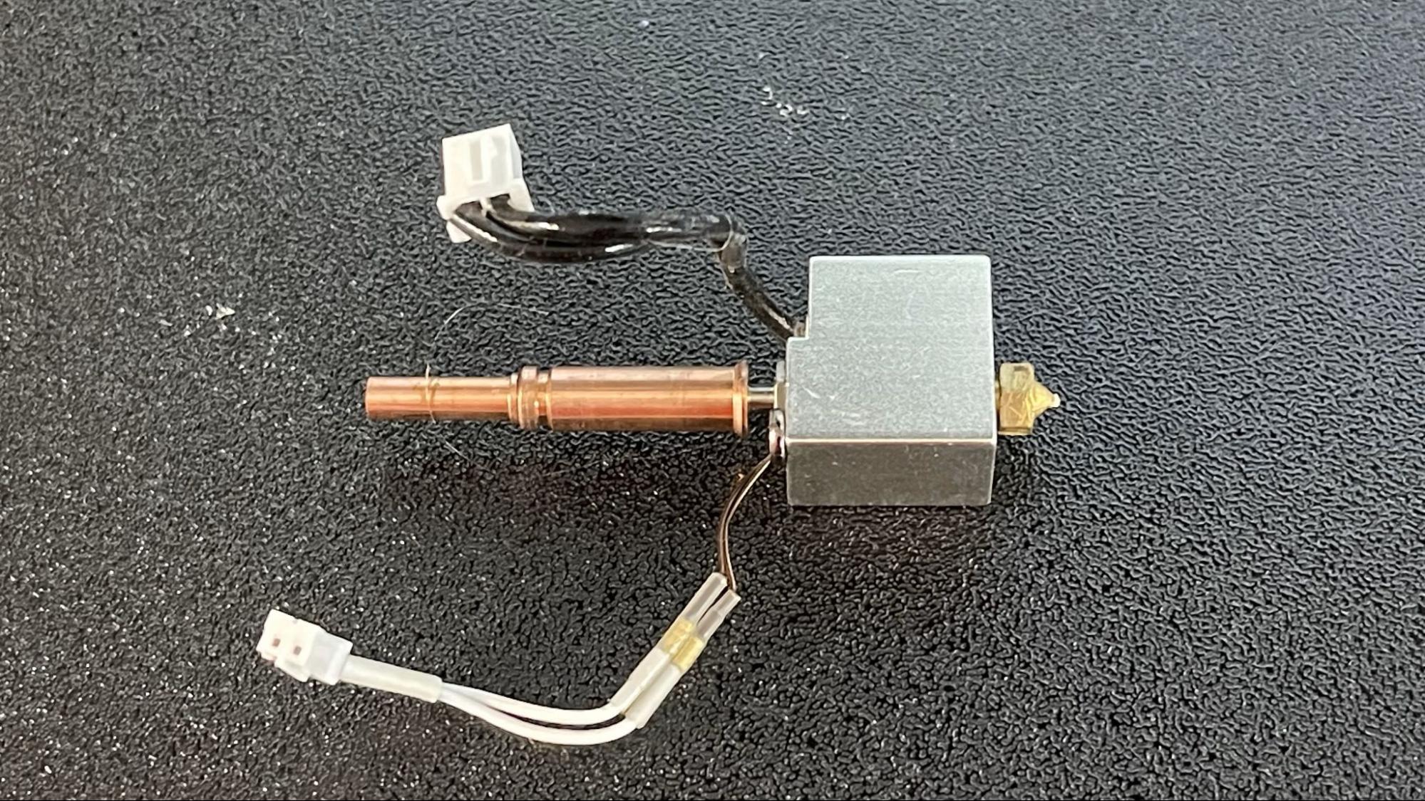 The hotend apart: heater block, heatbreak and High Flow nozzle