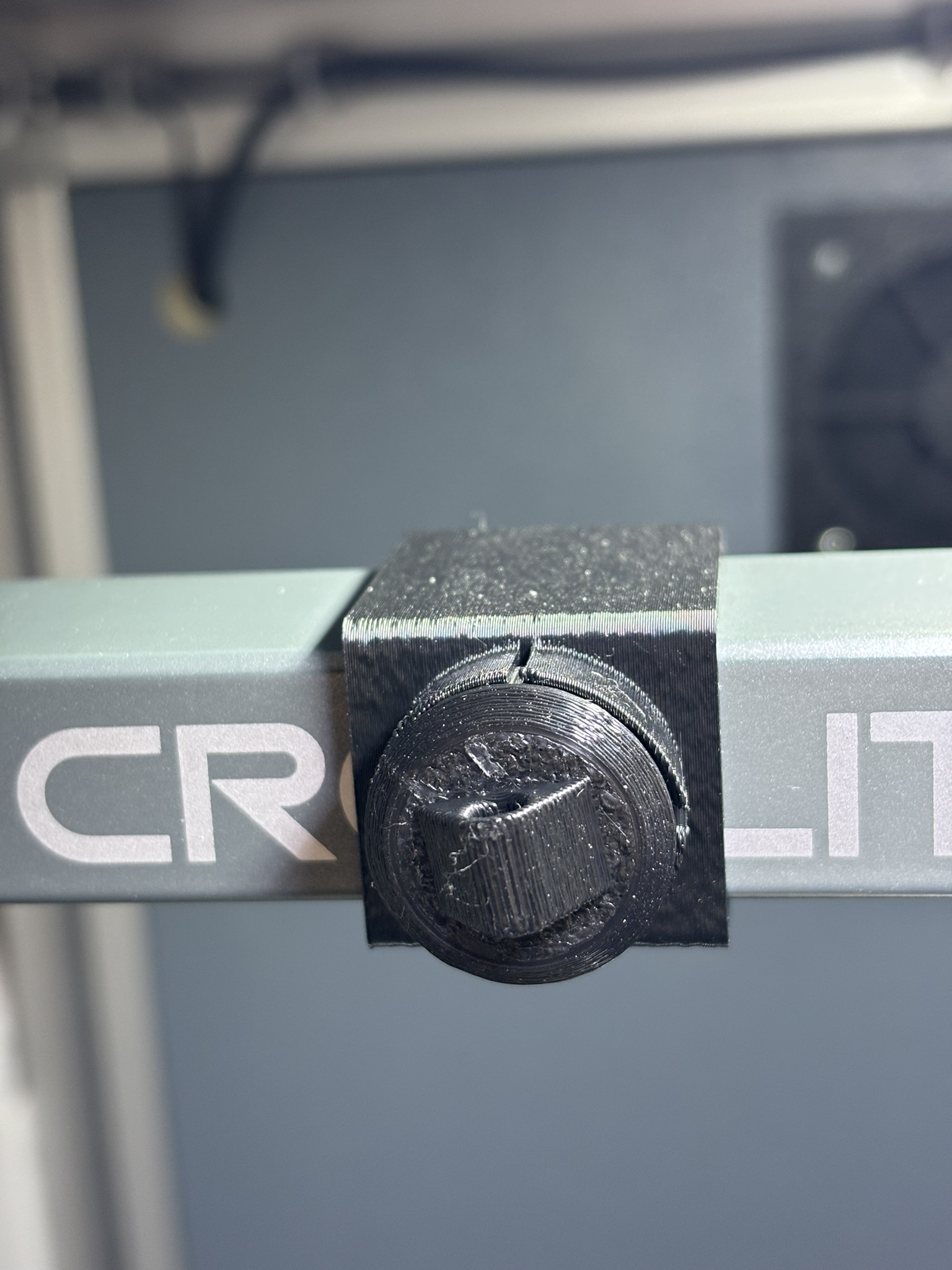 Printed clip with a 608 bearing on the top gantry beam of an Ender-3 V3