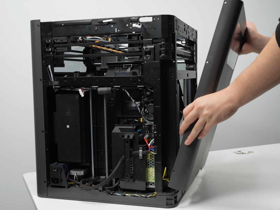 Left side panel removed from a Bambu Lab X2D exposing the internals