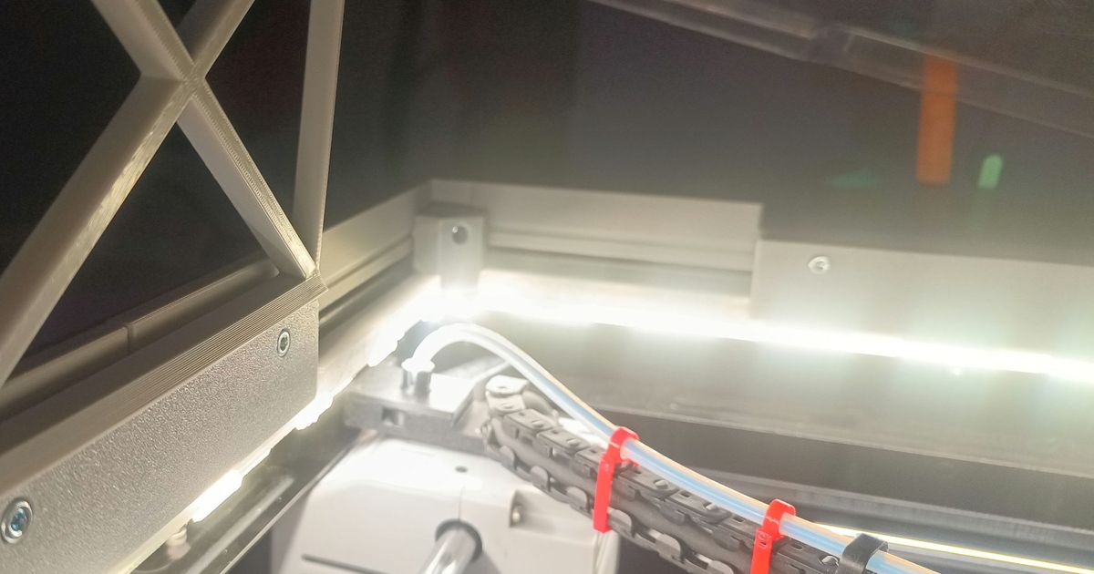 LED strip on a printed mount lighting the QIDI Q1 Pro chamber from inside