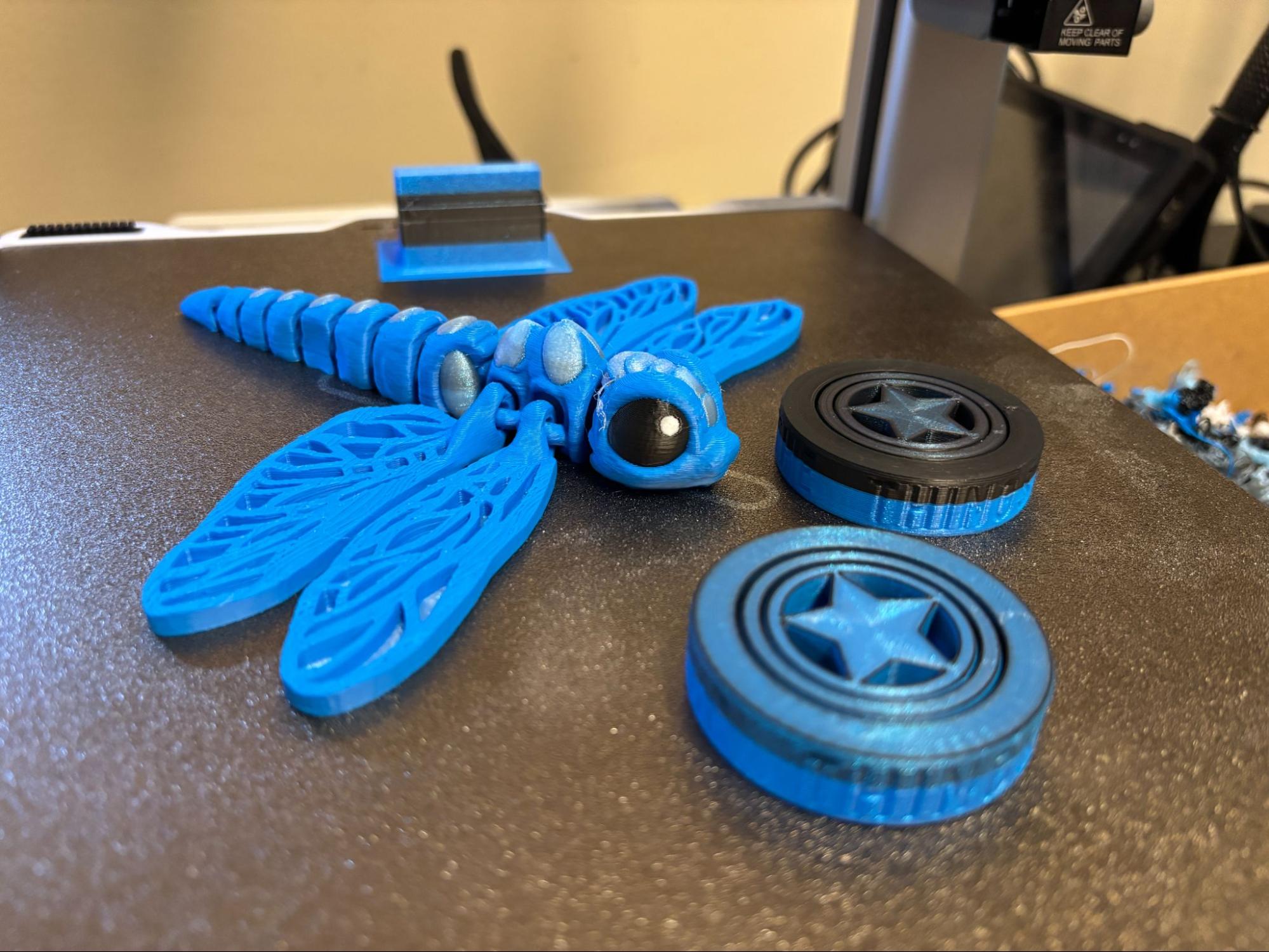 Multi-color print on SPARKX i7 — blue Cinderwing Dragonfly with two purge object shields